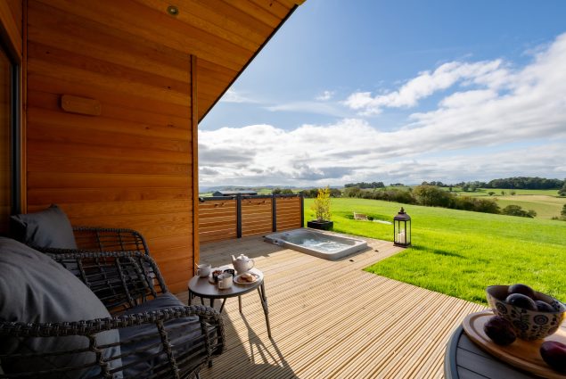 Private terrace with hot tub and countryside views at Kite Lodge